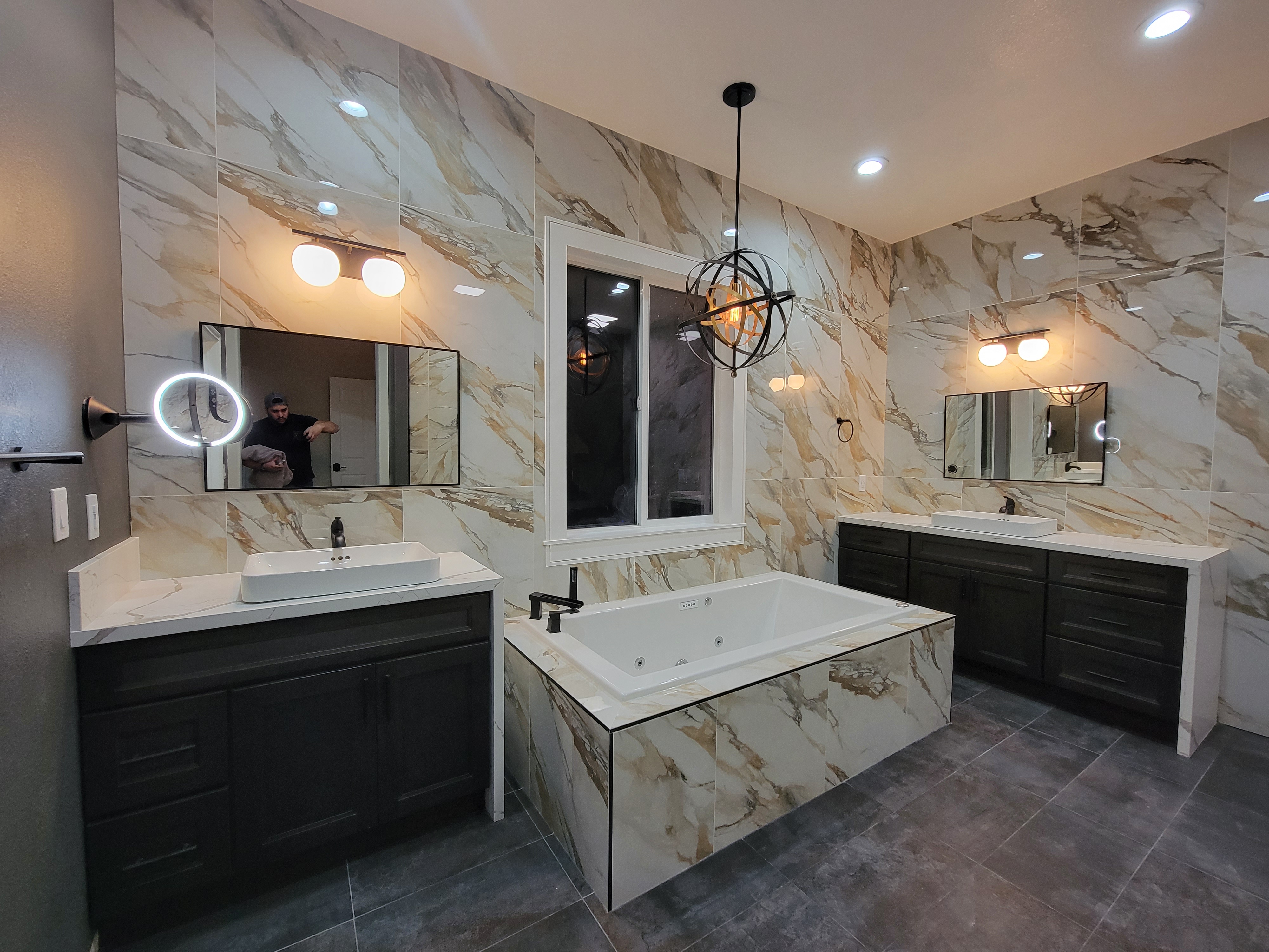 Marble master bathroom remodeled by VR Construction